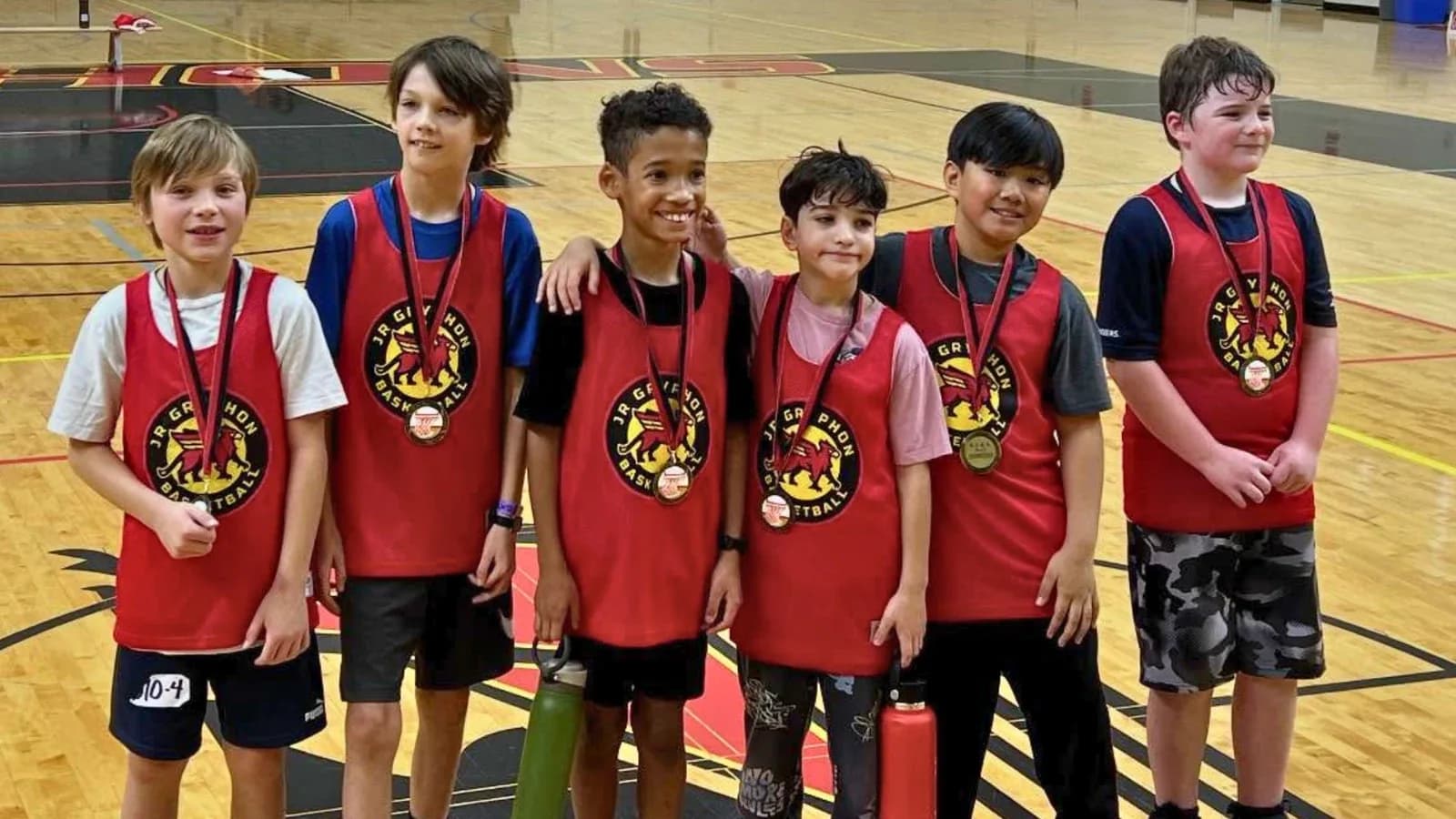 Junior Gryphons House League players with their medals