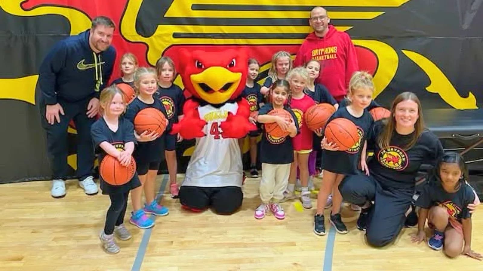 Junior Gryphons summer camp participants with the Gryphon mascot