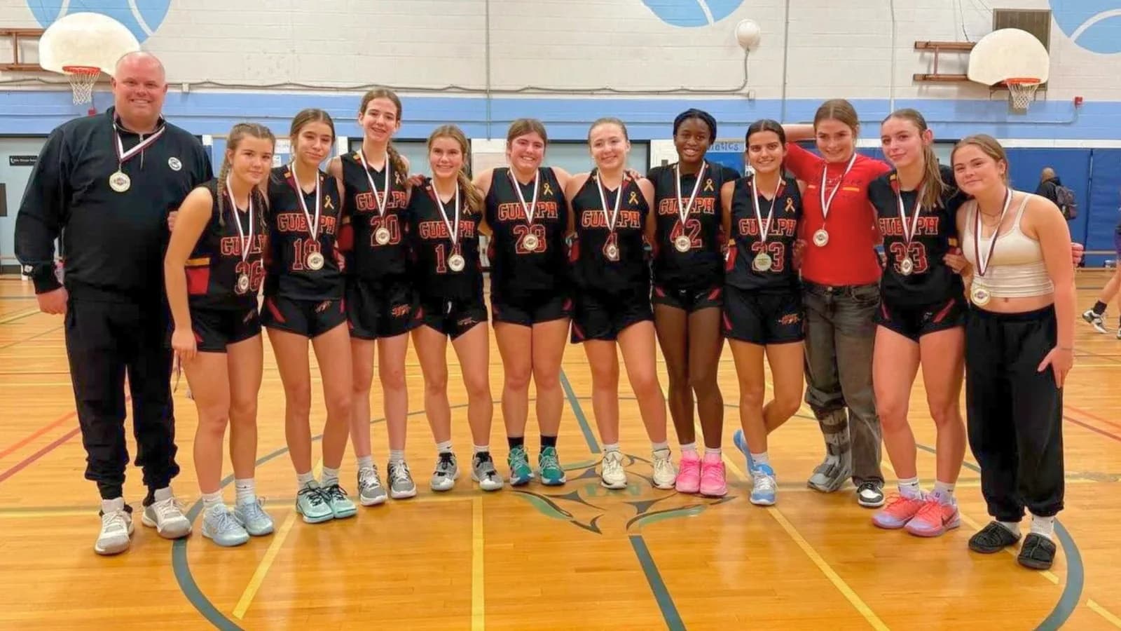 Junior Gryphons Rep girls team with their medals