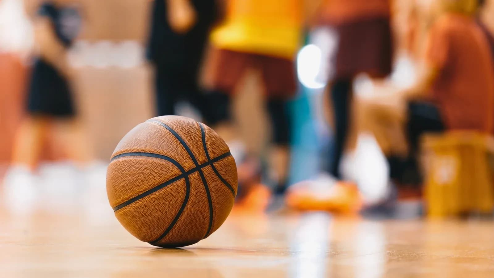 Basketball on a gym floor during a Junior Gryphons session